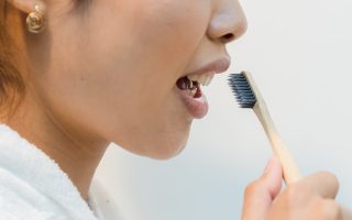 Close-Up Shot of a Person Brushing Her Teeth